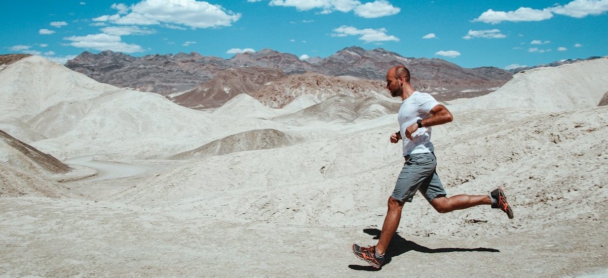 a man running in the desert